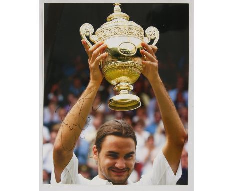 Roger Federer.- Autographed colour photograph, signed by the Swiss tennis player in black ink, Federer has won twenty Grand S