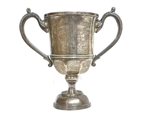 Large George V silver twin handle trophy engraved 'The Norman Trophy for Boys Primary School' the verso engraved with roll of