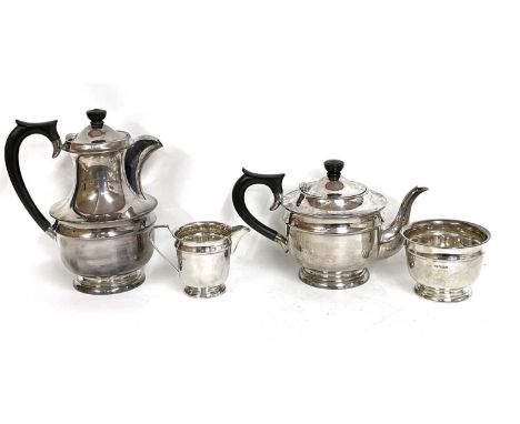 George VI silver four piece tea set comprising teapot, hot water jug, cream jug and bowl, hallmarked for Sheffield 1938, make