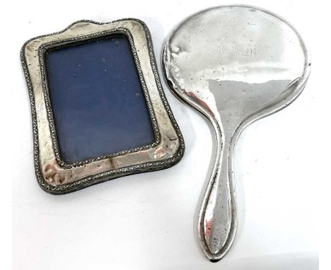 Mixed lot to include an Edwardian silver photograph frame, Birmingham 1908 (a/f) together with a silver mounted dressing tabl