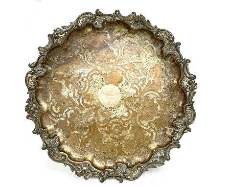 Georgian silver plated on copper tray of shaped circular form with applied cast scroll border, the centre chased with scrolls