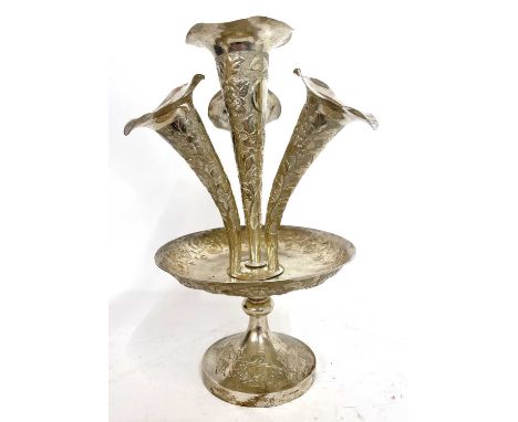 Chinese white metal four trumpet table epergne, chased and embossed with flowers and foliage, having a character mark to the 