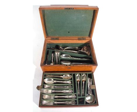 Antique canteen of silver plated cutlery with Kings pattern comprising twelve table spoons, eleven table forks, eleven desser