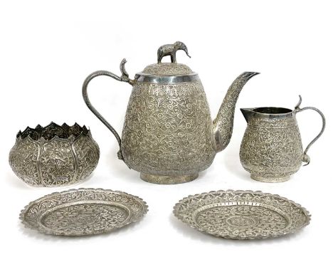 Antique Indian silver tea set 'Lucknow Circa 1900' with elephant and cobra design, comprising teapot, milk jug, sugar bowl to