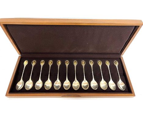 Cased Royal Society for the Protection of Birds silver spoon collection comprising twelve silver spoons each set with one of 