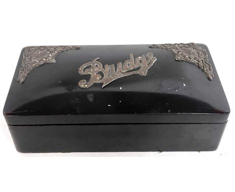 Edwardian ebonised bridge playing card box, the slightly domed hinged lid and corners applied with silver mounts, hallmarked 