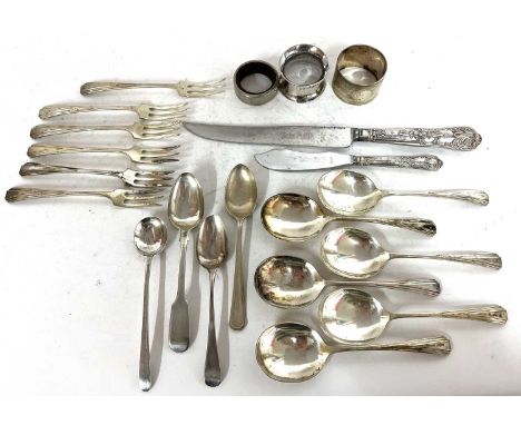 Mixed lot to include two hallmarked silver serviette rings, (one a/f), two Georgian teaspoons, two other silver teaspoons, 12