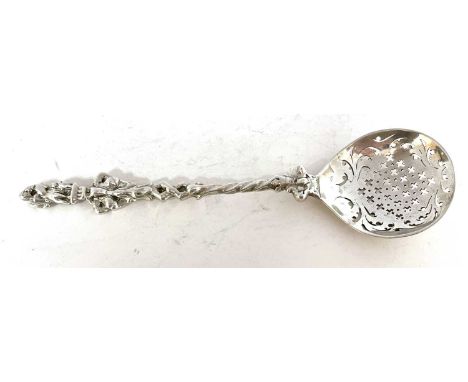 Victorian silver marriage spoon, the pierced oval bowl to a cast handle with a figural embrace terminal, hallmarked London 18