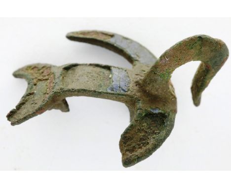 Iron Age, early cast ornament of bird, L: 28 mm. P&amp;P Group 0 (£5+VAT for the first lot and £1+VAT for subsequent lots) 