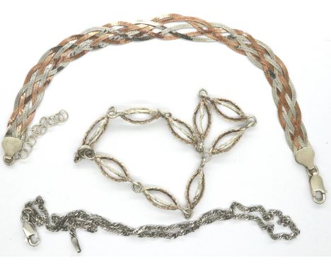 Three 925 silver bracelets to include a two tone example, largest L: 30 cm. P&amp;P Group 1 (£14+VAT for the first lot and £1