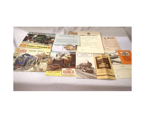 Hornby Dublo catalogues no 1 and 2, book of trains 1959, instruction book for 8F/castle etc. Also includes Hornby railway com