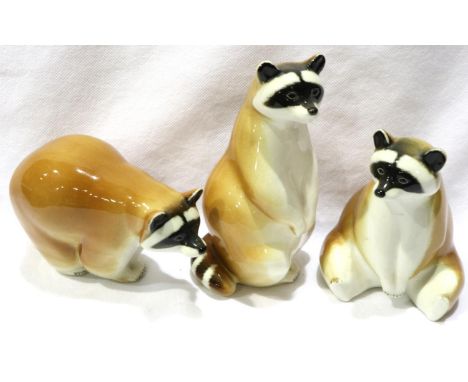 Three Lomonosov racoons, largest H: 15 cm. P&amp;P Group 2 (£18+VAT for the first lot and £3+VAT for subsequent lots) 