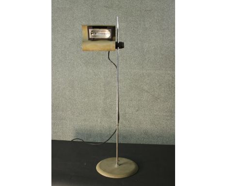 A vintage height adjustable industrial style floor lamp. H.101cm. 