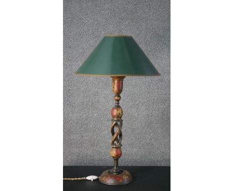 A late 19th century Indian Kashmiri papier-mâché table lamp with floral design and green and gold fabric shade. H.72cm 