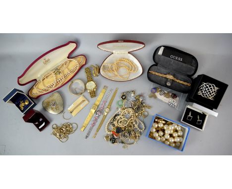 Group of costume jewellery, gold plated bangle,  Kigu heart form compact, Guess watch  and other items PROVENANCE: Sold on be