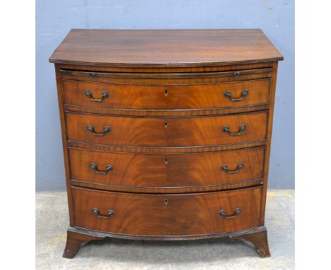 Early 20th century mahogany bow fronted chest with brushing slide over four long graduated drawers on bracket base
