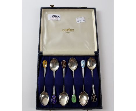Cased set of sterling silver and multi coloured enamel spoons with tribal hunting scene 