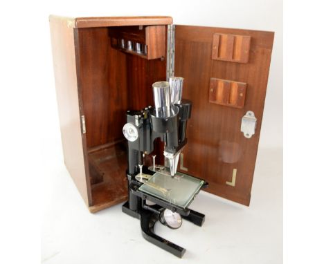 Mid 20th century binocular microscope, by W Watson & Son Ltd. London, no.12357, in fitted case, with lenses, 35 cm highProven