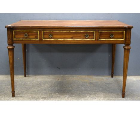 Mahogany writing table with three drawers