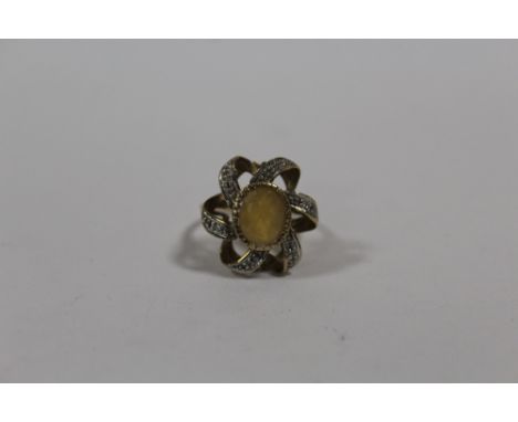 A HALLMARKED 9 CARAT GOLD DRESS RING SET WITH A CITRINE SIZE N APPROX WEIGHT - 4.8G 