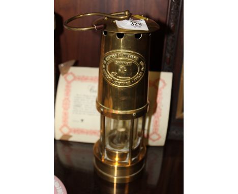 A BRASS THOMAS &amp; WILLIAMS CAMBRIAN MINERS LAMP WITH CERTIFICATE OF AUTHENTICITY