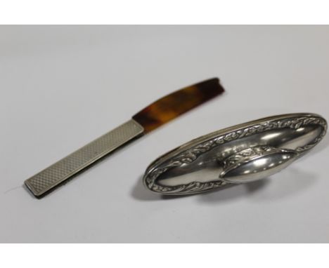 A VINTAGE HALLMARKED SILVER FOLDING COMB, TOGETHER WITH A FRENCH SILVER NAIL BUFFER  