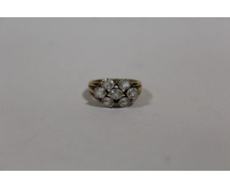 A HALLMARKED 9 CARAT GOLD SEVEN STONE DRESS RING SIZE N APPROX WEIGHT - 3.9G 