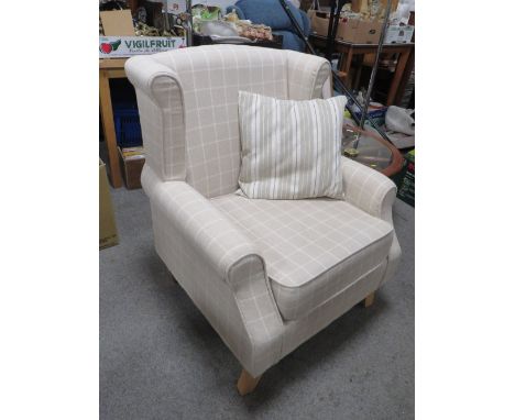 A MODERN LIGHT CHEQUERED ARMCHAIR