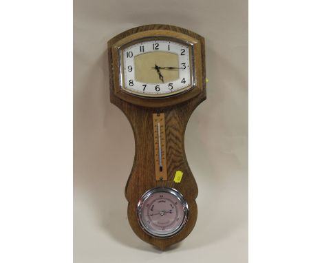 A LIGHT OAK GARRARD WALL BAROMETER/CLOCK