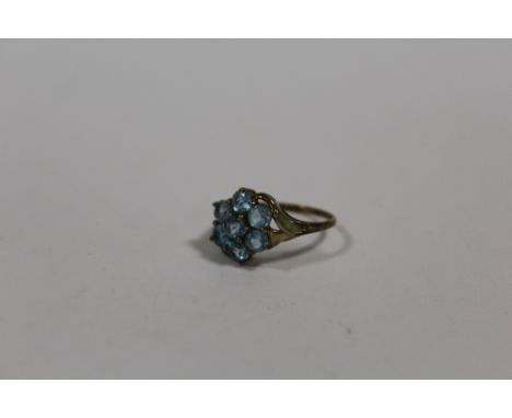 A 9 CARAT GOLD BLUE TOPAZ SET DRESS RING SIZE P APPROX WEIGHT - 2.5G 