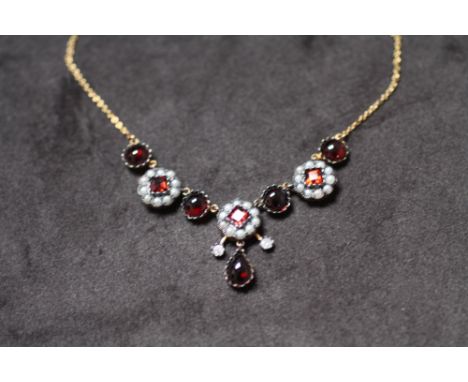 A NECKLACE SET WITH CABOCHON GARNETS, step-cut garnets, seed pearls and diamonds, boxed