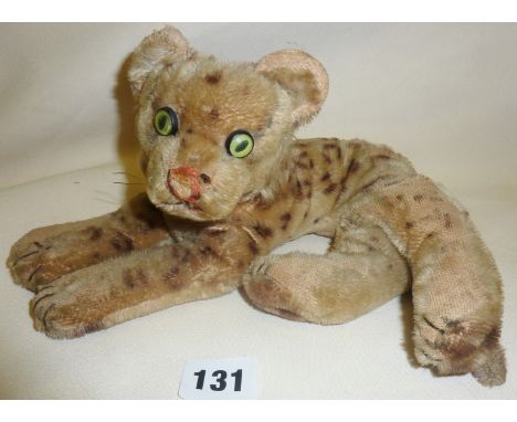 Vintage leopard with green eyes stuffed toy, possibly Steiff