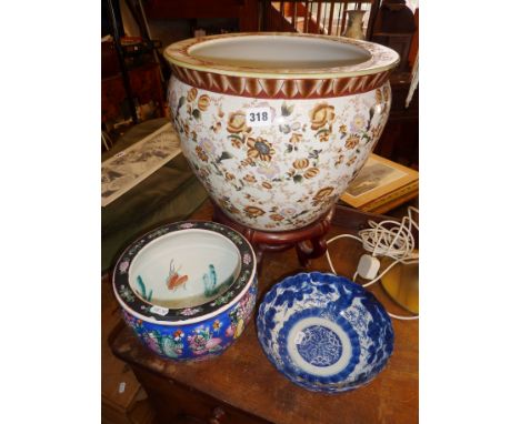 Large Chinese porcelain jardiniere on stand, blue and white bowl and another planter decorated with fish
