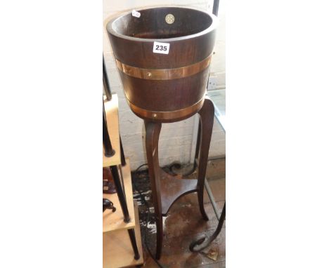 Copper bound oak barrel planter on stand by R. Lister of Dursley