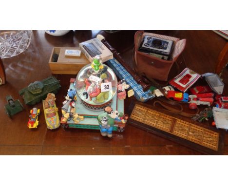 Disney character musical snow globe, some diecast vehicles, a box Brownie, etc.