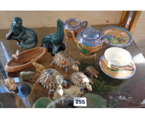 Two Poole Pottery Seals, some Wade tortoises and a Japanese china child's teaset 