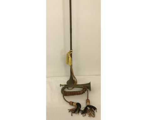 A vintage brass and copper military bugle complete with braided grip cord and tassels. Together with a bras and coppers hunti