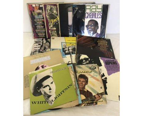 A box of vintage skiffle, blues and swing records. To include Big Joe Turner, Lightning Hopkins, Nina Simone, Ray Charles, Ja