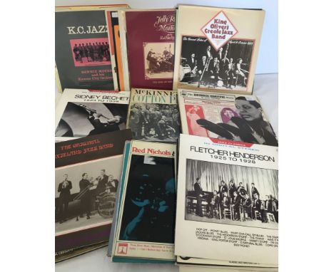 A box of vintage vinyl jazz records. To include Jelly Roll & his Red Hot Peppers, Sidney Bechet and King Oliver. 