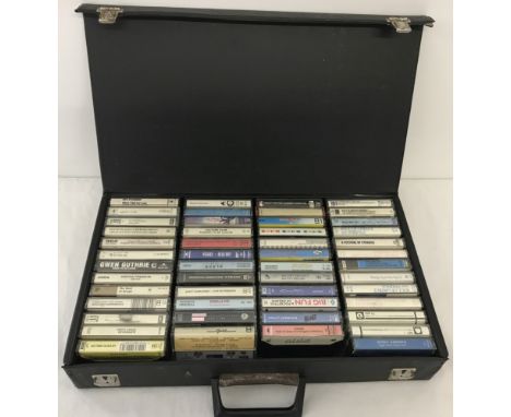 A black case containing 50 vintage music tapes. To include; OMD, Big Fun, Whitney Houston and Culture Club. 