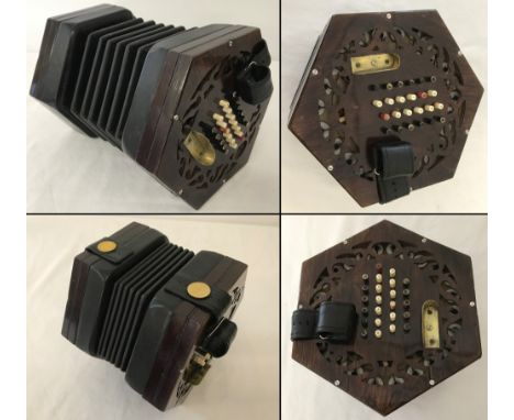 A vintage Lachenal English 48 button Rosewood Concertina. Has had some restoration. Vendor advises Lachenal name was removed 