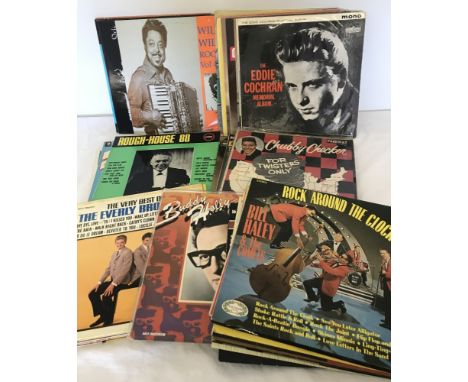A box of vintage rock and roll vinyl records. To include Chubby Checker, Bill Hayley & The Comets, Buddy Holly, The Everly Br