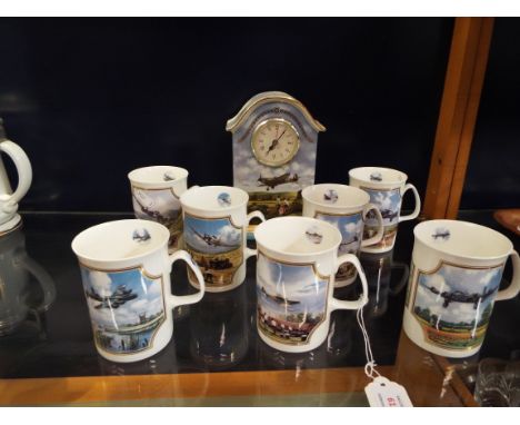 A limited edition Bradford Exchange ceramic pictorial clock depicting a low flying Spitfire together with seven Davenport lim