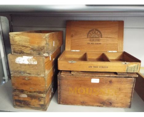 A vintage wooden Moussec box with five other boxes 
