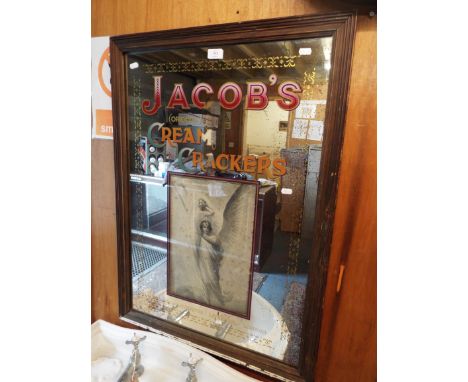 A vintage advertising mirror for 'Jacob's Cream Crackers'