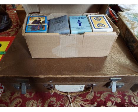 A mixed selection of assorted ephemera and news cuttings and a vintage playing cards