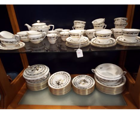 A Royal Worcester 'Bernina' diner/tea service comprising of nine teacups and ten saucers, nine coffee cups and saucers, sugar