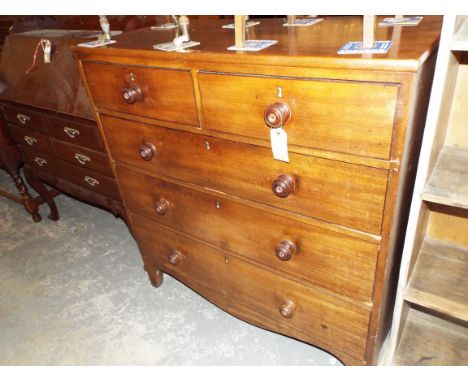 A Victorian mahogany chest of two short over three long graduated drawers raised in bracket feet 