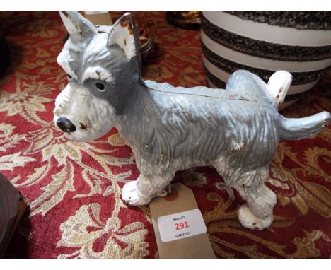 A cast iron door stop in the form of a scotch terrier 