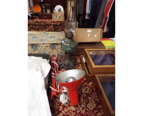 A Victorian green glass oil lamp together with an anglepoise lamp